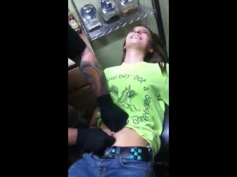 Cute girls belly button piercing