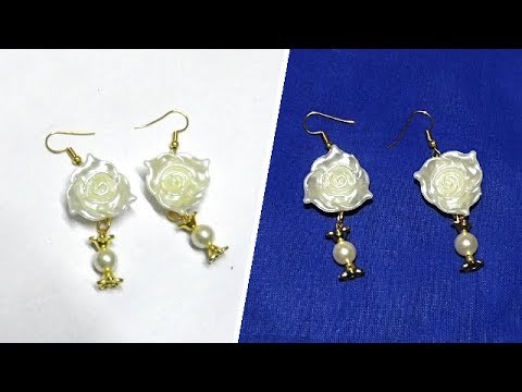 Watching video Bead Jewelry Making: How to Make Designer Pearl Rose Bead Hanging Earrings in 5mins | Uma