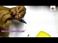 Watching video Bead Jewelry Making: How to Make Designer Pearl Rose Bead Hanging Earrings in 5mins | Uma