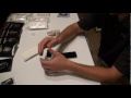 Zagg installs Invisible Shield on iPhone 4