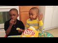Zay Zay & Jojo tasting Chicken and Waffles flavored chips