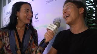 Sports Illustrated 2022 Paraiso Red Carpet Nick Interviews Kelsey Farley Wears Jilly Rocks Designs
