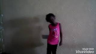 A little girl dancing to (science student)