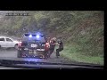 Virginia policeman saves fellow officer from oncoming car