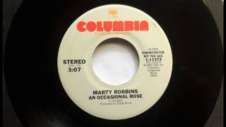 Watch Marty Robbins An Occasional Rose video