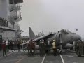 US Marines embark Harriers onto HMS Illustrious