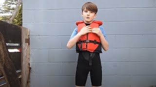 How To Put On A Wetsuit And Life Jacket