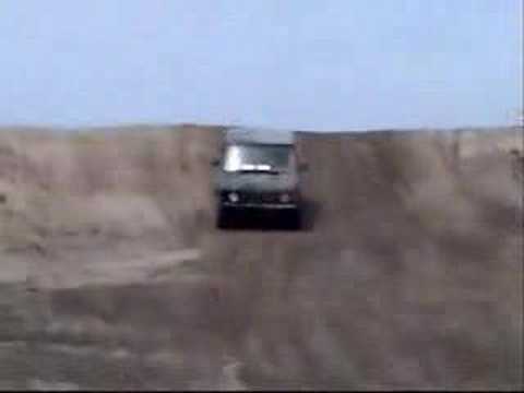 Range Rover Classic jump during off road racing race