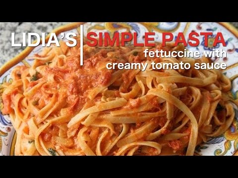 VIDEO : simple pastas: fettuccine with creamy tomato sauce - i prepare fettuccine with mafalda sauce, a tomato and cream sauce.i prepare fettuccine with mafalda sauce, a tomato and cream sauce.recipeon my website: http://lidiasitaly.com/i ...