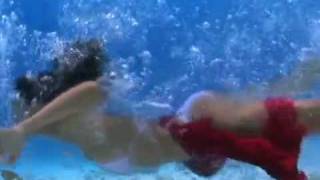 Women Swimming In The Sea