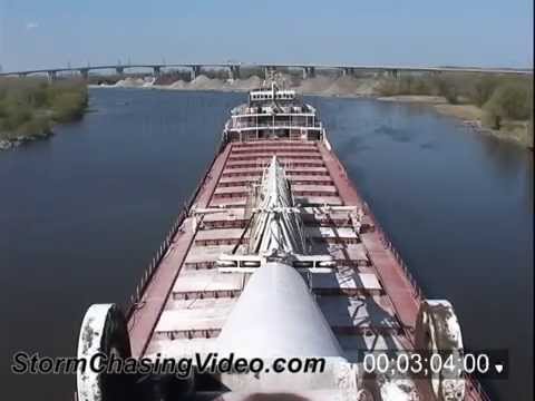 Time-Lapse stock footage of the great lakes freighter Wilfred Sykes coming and leaving port.