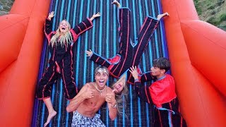 WE STUCK OUR GIRLFRIENDS ONTO A WALL!