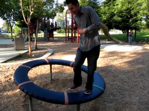 weird spinning wheel on playground - YouTube