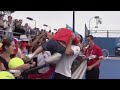 Novak Djokovic hits with a fan - 2014 Australian Open