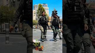 Women Protecting Men Border Police In Jerusalem.