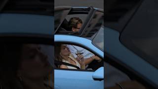 Lady Smoking Cigar In Porsche