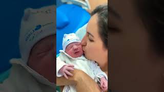 New Born Baby Kisses Mom