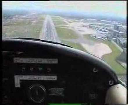Landing a PA-38 at Manchester Airport runway 24R (subtitles available)