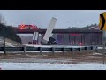 RAW VIDEO: Tractor-trailer falls, leans against Durham NC I47 overpass over US 15-501