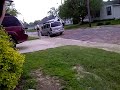 girl riding bike for the first time girl meets dog