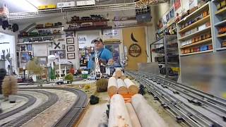 Camera Takes A Ride On A Model Train At The Toy Train Depot