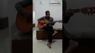 Cowo main gitar