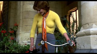 Tina Aumont in tight yellow sweater (Braless) Getting on a Bicycle 1080P BD