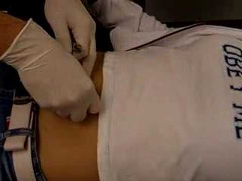 Me getting my belly button pierced Me getting my belly button pierced
