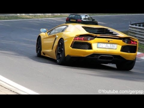 When i was walking near the ring suddenly this yellow Aventador drove by