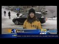 2012 Seattle Snow - KING 5 reporter accosted by an angry snow tuber!