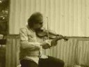 Dloganfoster, playing the fiddle in Iva