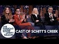 The Schitt's Creek Cast on Slow-Burn Success, Red Carpet Stanning and Moira's Wigs