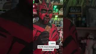 Darth Maul Enjoying A Gummy Rat