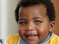 Wonderful black baby with blue eyes ,