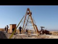 raise 30 footy windmill  tower with a boat trailer winch and a lot of prayer and help.