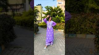 Candid Poses In Suit Santoshimegharaj