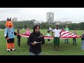 Rhonda Begos recites a memorial poem on September 11th at the Frank Mots Kite Festival