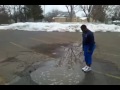 kid jumps in what he thinks is a puddle