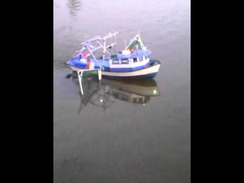 Rc shrimp boat lafitte skiff with skimmers - YouTube
