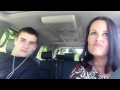 White mom and son dancing to rap in the car