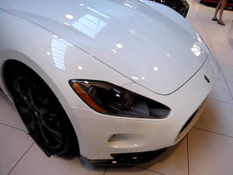 A White Maserati Gran Turismo MC Sport Line At The Ferrari Dealership In