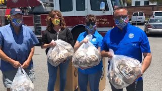 Second Harvest Food Bank food giveaway at the Pontchartrain Center