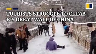 Tourists Struggle To Climb Icy Great Wall Of China