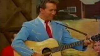 Watch Marty Robbins All The World Is Lonely Now video