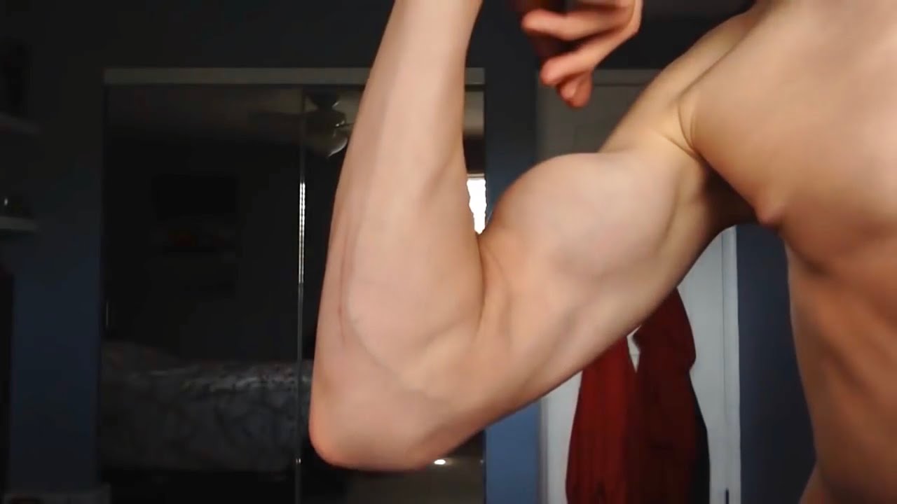 Skinny fitness flexing webcam