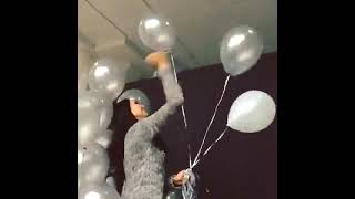 Beautiful Girl Stabbing Balloons After The Event Looner Squad