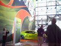 javits center auto show: green chrome camaro and red 911