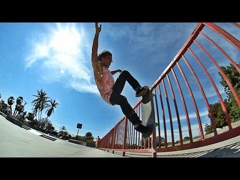 Skater Grinds Up A Fence