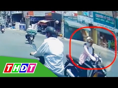Người phụ nữ ngang nhiên vượt đèn đỏ gây tai nạn rồi lạnh lùng bỏ đi | THDT