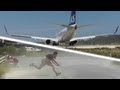 JET BLAST throws person on the ground! SAS 737 at the Second St Maarten! Skiatho